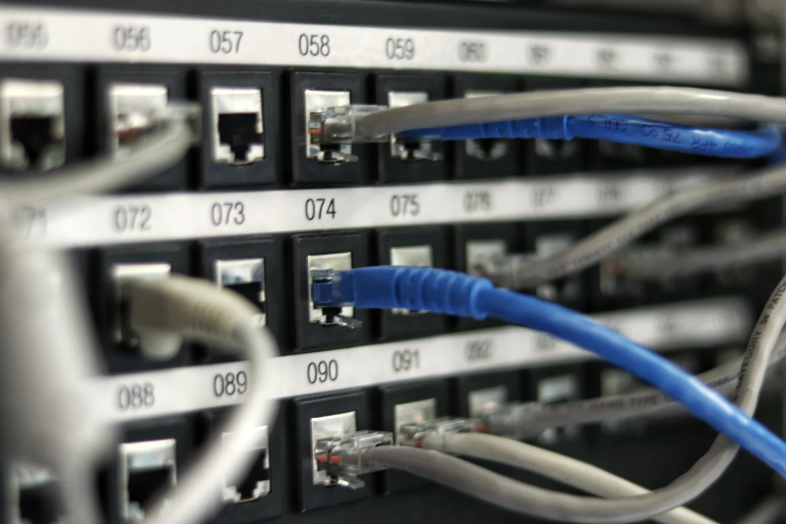 Network infrastructure cabling in an operating facility.